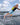 Wakesurfer executing a deep, powerful bottom turn at the base of the wave on the Phase 5 Trident.