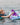 Young girl grom in the water with her 2026 Ronix August board and boot package, ready for her first set.