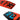 Close-up of the bottom of the Ronix Kid's Vault wakeboard highlighting the molded-in fins, large removable center fin, and asymmetrical channel design.