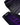 Close-up of the Ronix One Blackout wakeboard's bottom surface showing the speed walls, fins and channels.