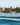 Parks Bonifay executing a clean, controlled toeside wake-to-wake jump on his 2026 Ronix Parks wakeboard setup.