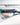 Close up of Seafoam Phase 5 Pro Surf Handle with high-tack suede grip on the back of our boat.