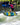 Young girl riding the top of the wave on the Ronix Kid's Powertail Sonic.
