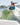 Young boy catching air and performing an ollie on the lightweight Kid's Sonic Skimmer.