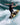 Wakesurfer performing a frontside slide on the 2026 Ronix Koal Classic Fish wakesurfer.