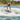 Pro rider Bryce Gardener performing a surface 360 on the 2026 Ronix M50, demonstrating its versatile twin-fin feel.