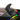 Close-up of the quad-fin configuration featuring the Ronix tool-less Button Fin system, cheese grater fin and nubs on the new 2027 Ronix M50 Dark Matter wakesurfer.
