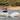 Dylan Matthews, pro wakesurfer, executing a huge air shuv-it on his new pro model, the 2027 Ronix OSMO Skimmer.