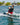 Rider performing a deep water start on the 2026 Ronix Vault, showing its beginner-friendly stability.
