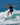 Female rider cruising effortlessly on the beginner-friendly 2026 Ronix Women's Fish wakesurf board.