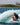 Female wakesurfer crouching low in the sweet spot for stability on a Ronix Women's Fish.