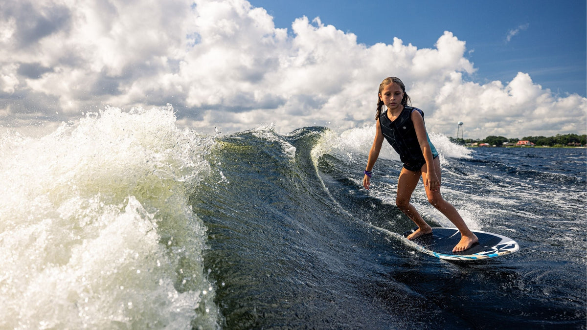 Young grom learning how to stay in the sweet spot on the new 2026 Phase 5 Shrimp Wakesurf Board. 