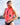 Blonde woman zipping up a Follow impact vest before wakesurfing, preparing for a ride behind the boat.
