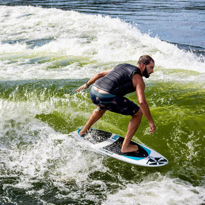 John Akerman tucked in the sweet spot, demonstrating the incredible down-the-line speed of the Phase 5 Ahi wakesurf board.