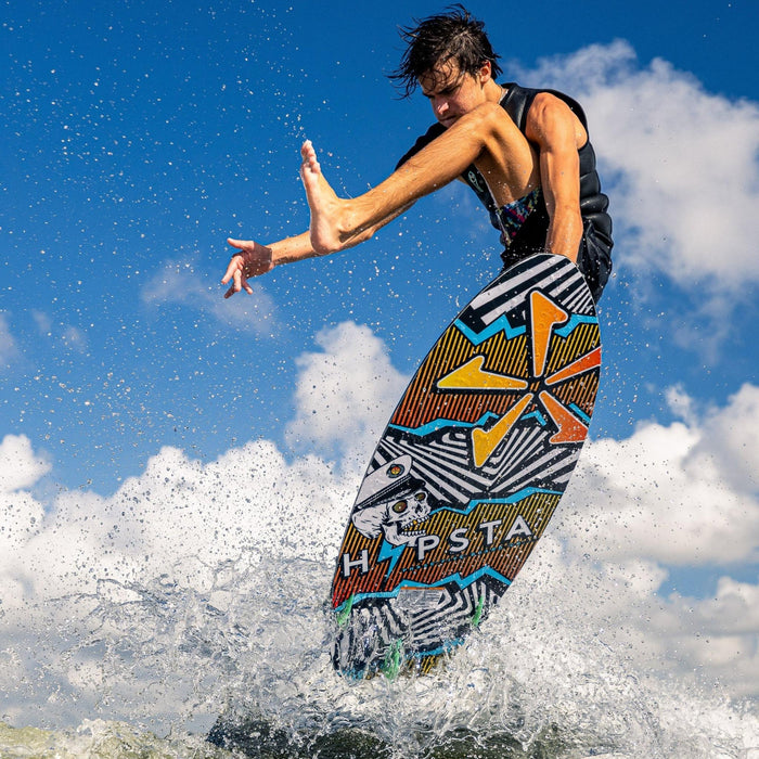 Pro rider performing a stylish front leg kick-out air on the 2026 Phase 5 Hypsta.