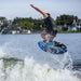 Young pro rider Jett Lambert spinning a clean ollie 360 on the lightweight Key Jett Shreds skim board.