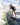 Young grom successfully surfing the wave on the stable Phase 5 Scamp kid's board.