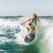 Pro rider Kira Lewis cruising in the sweet spot on the high-performance Carbon Air Core 4 Skimmer.