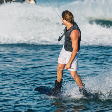 Pro rider Tyler Higham charging on his Ronix One Blackout board with the Gloss Midnight One boots.