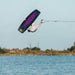 Pro rider Tyler Higham performing a massive inverted air on the ultralight 2026 Ronix One Blackout.