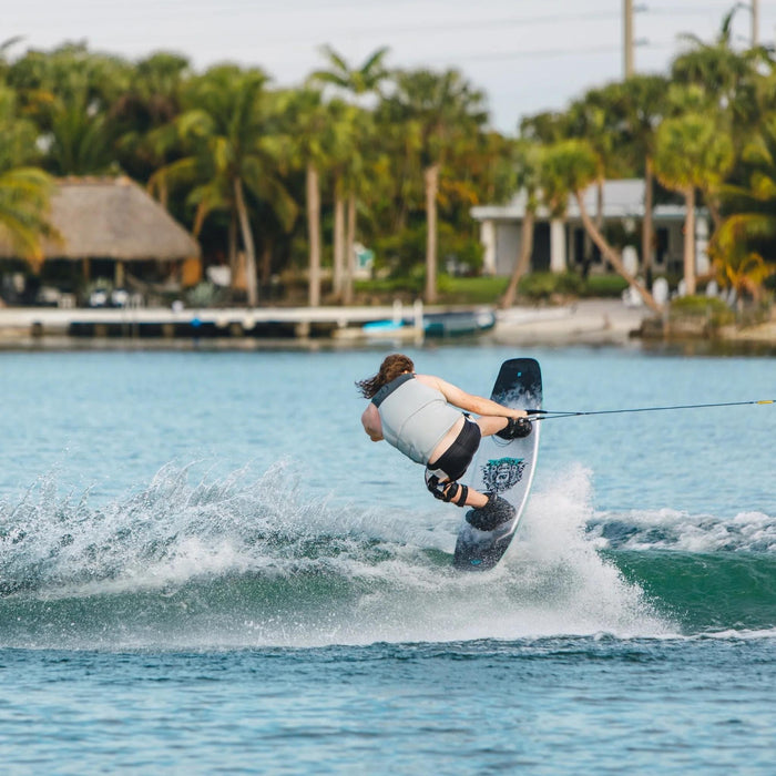 Legendary pro rider Parks Bonifay performing a stylish lip slide on his signature 2026 Ronix Parks wakeboard.