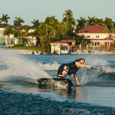 Pro rider Parks Bonifay laying down a massive, high-speed carve on his 2026 signature Ronix Parks continuous rocker wakeboard setup.