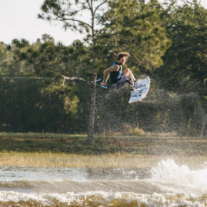 Massi Piffaretti mid-rotation during a technical 720 on the 2026 Ronix RXT, showing the board's low swing weight.