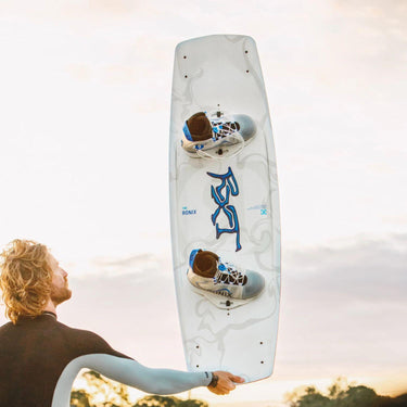 Pro rider Massi Piffaretti holding his complete RXT board and boot package with one hand to show the ultra-lightweight design.