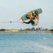 Pro rider Jake Pelot performing a massive indy grab backroll on his 2026 Ronix Supreme pro model wakeboard.
