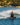 Wakeboard rider confidently carving outside the wake on the complete 2026 Ronix Vault District wakeboard setup.