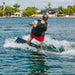 Rider performing a deep water start on the 2026 Ronix Vault, showing its beginner-friendly stability.