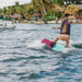 Female rider learning a deep water start on the stable and forgiving Ronix Women's Krush.
