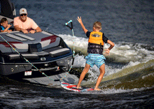 Load image into Gallery viewer, 2024 Ronix Top Grom Youth CGA Life Vest - Wakesports Unlimited | Action Shot
