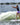 Side view of a female rider throwing the Phase 5 Standard Wakesurf Rope back into the boat.