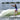 Side view of a female rider throwing the Phase 5 Standard Wakesurf Rope back into the boat.
