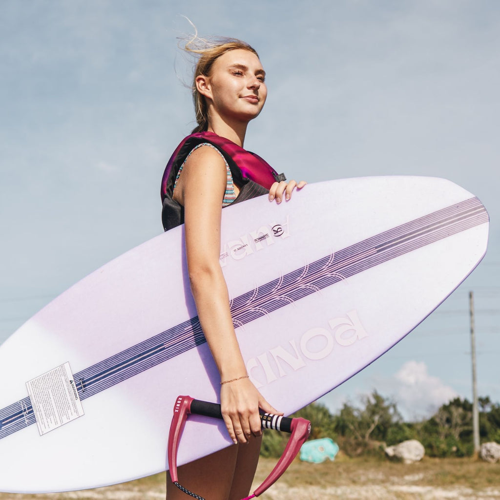 2026 Ronix Aura Women's Flyweight Skimmer product video featuring technical specs, Flyweight tech, and skim action clips.