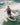 Eric Ruck, pro rider, having fun on both knees without the rope, demonstrating the stability of the Ronix Aloha Longboard.
