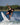 Wakesurfer performing an air 360 rotation on the 2026 Ronix Atlantik Flyweight Pro.