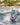 Young girl smiling while wakeboarding on the Ronix August, demonstrating confidence and stability.