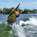 Boy, Camden Small, catching air off the wake on the lightweight 2026 Ronix Fish Sonic wakesurf board.