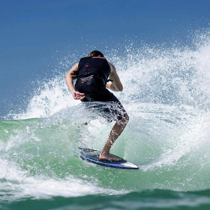 Pro rider Bryce Gardener whipping the Ronix Brightside through a powerful turn at the top of the wake.