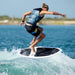Beaux Wildman executing a technical 360 surface shuv-it on the responsive Ronix Flyweight skimmer.