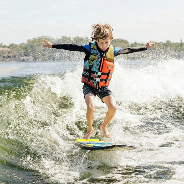 Youth rider performing a body varial trick on the stable Ronix Powertail Sonic.