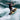 Wakesurfer performing a frontside slide on the 2026 Ronix Koal Classic Fish wakesurfer.