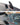 Close-up of the quad-fin configuration featuring the Ronix tool-less Button Fin system on the M50.
