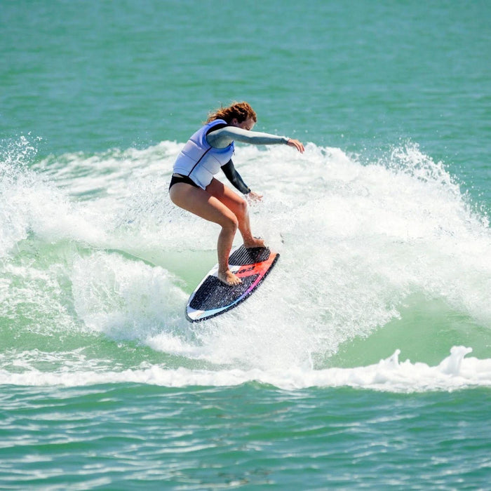 Pro Rider Jamie Lopina slashing out the wake on the new Ronix Standard Core Skimmer. 