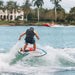 Rider cruising comfortably on the 2026 Ronix Standard Core Skimmer, showing its stable skim profile.