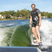 Rider standing tall and cruising in the sweet spot of the wake on a 2026 Ronix Wave King XL Wavesurfer.
