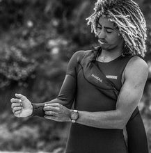 Load image into Gallery viewer, 2024 Manera Seafarer 4.3 Pewter Wetsuit - Wakesports Unlimited | Action Shot
