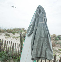 Load image into Gallery viewer, 2024 Manera Bamboo Poncho Seagreen Changing Towel - Wakesports Unlimited | Action Shot
